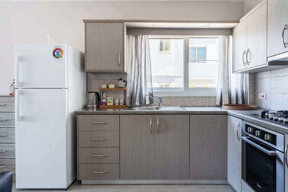 Apartment, Balcony | Private kitchen | Coffee/tea maker, electric kettle