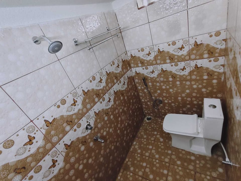 Standard Double or Twin Room, Courtyard View | Bathroom | Shower, slippers, towels, soap