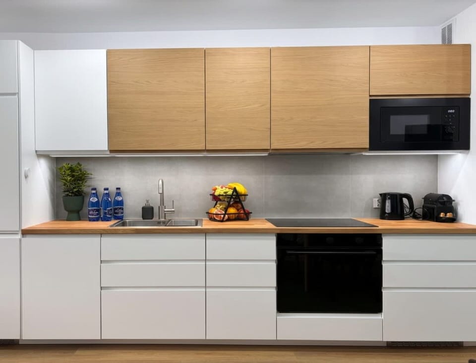 Apartment | Private kitchen | Cleaning supplies