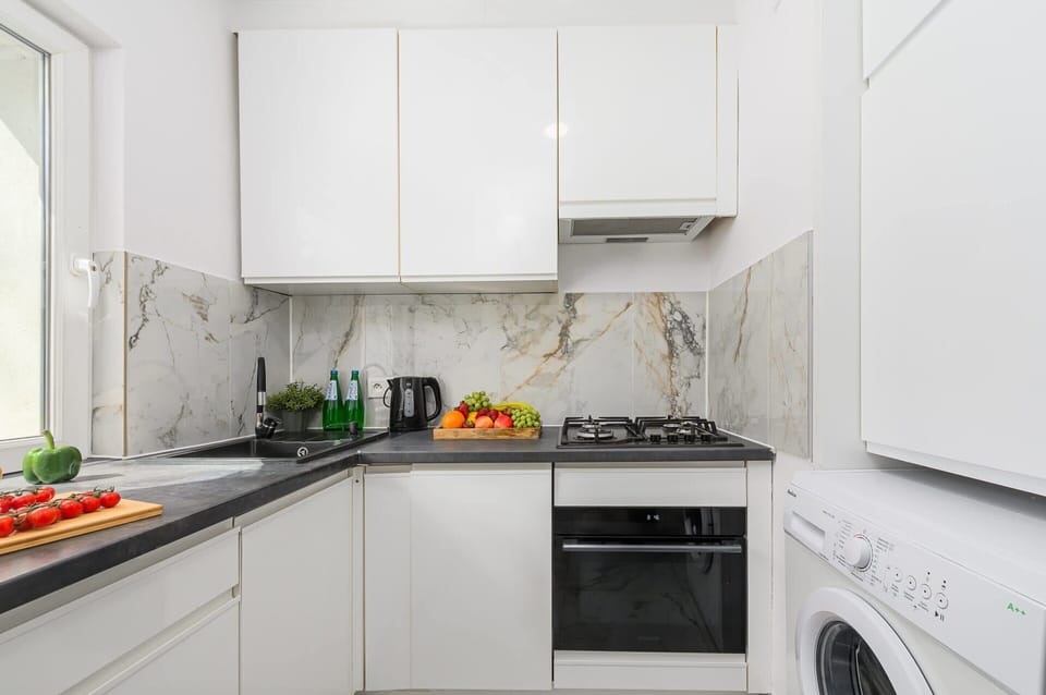 Apartment | Private kitchen | Cleaning supplies
