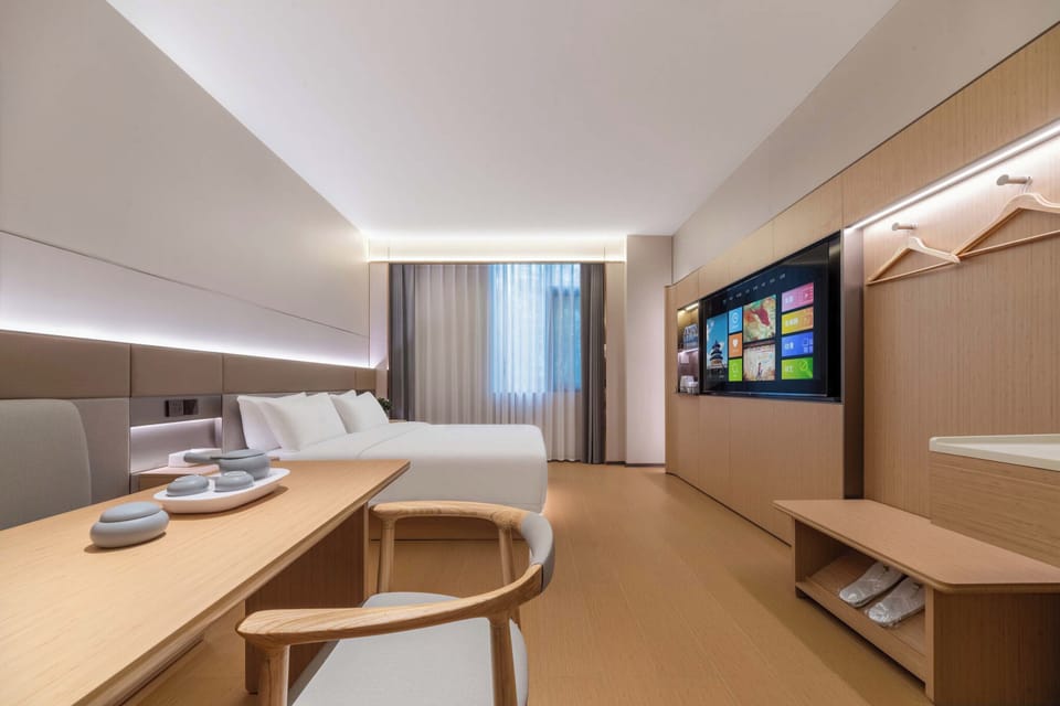 Superior Double Room, City View | Minibar, desk, laptop workspace, blackout drapes