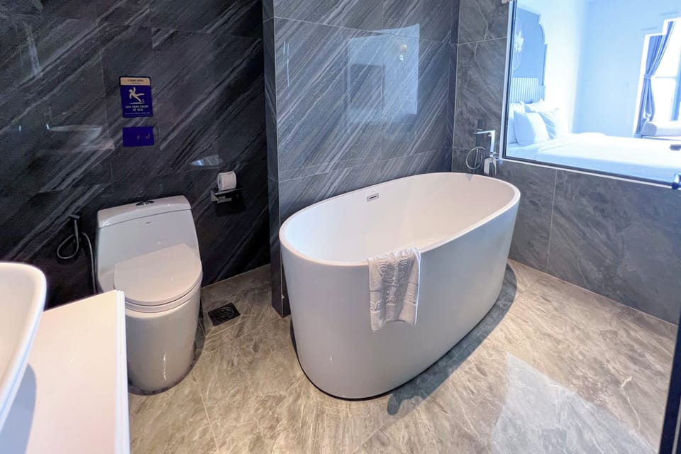 Hair dryer, towels, soap, shampoo
