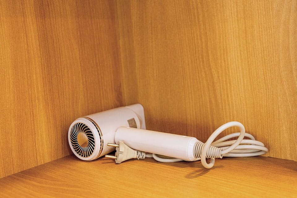 Shower, free toiletries, hair dryer, slippers