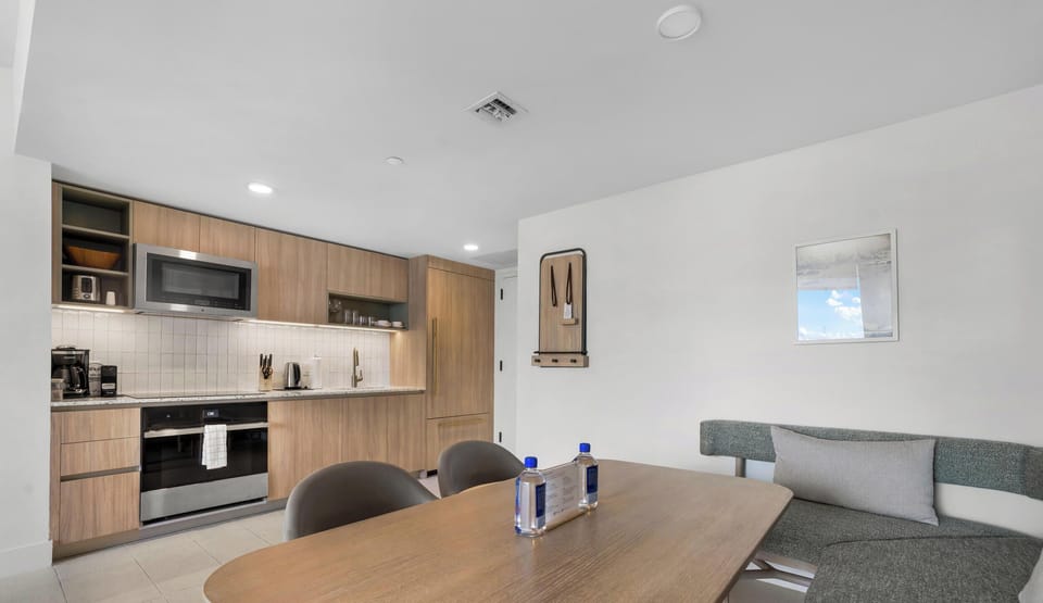Condo, Balcony, City View | Private kitchen | Espresso maker, fridge, dishwasher, cookware/dishes/utensils