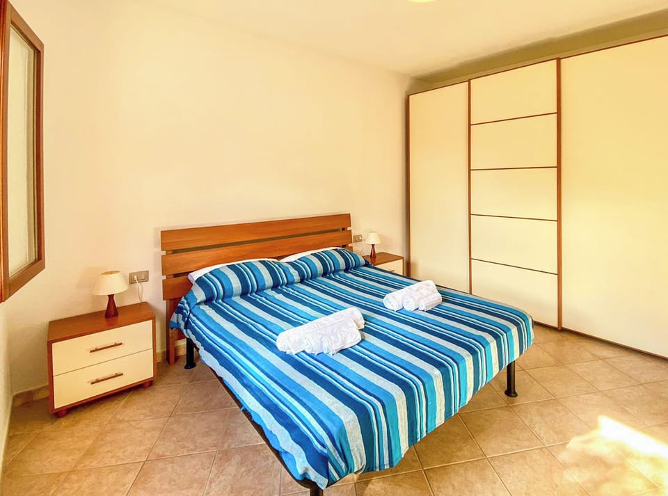 Apartment, Patio, Garden View | Iron/ironing board, WiFi (free)