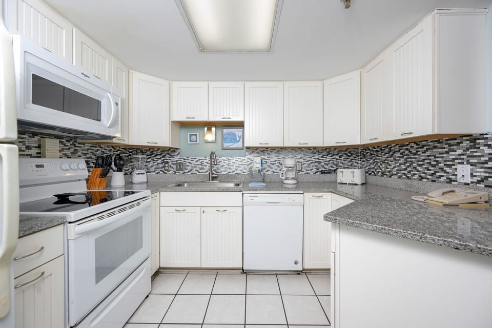 Condo, 2 Bedrooms | Private kitchen | Coffee/tea maker, fridge, oven