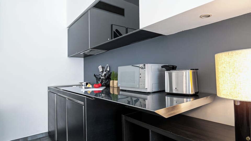 Basic Studio | Private kitchen | Microwave, electric kettle, highchair