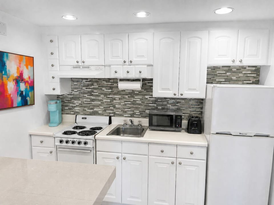 Signature Suite, 1 Bedroom, Balcony, Mountain View | Private kitchen | Coffee/tea maker