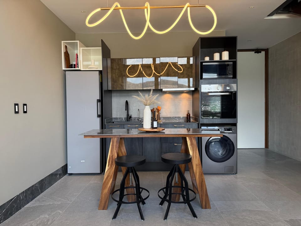 Luxury Duplex, City View | Private kitchen | Full-size fridge, microwave, oven, stovetop