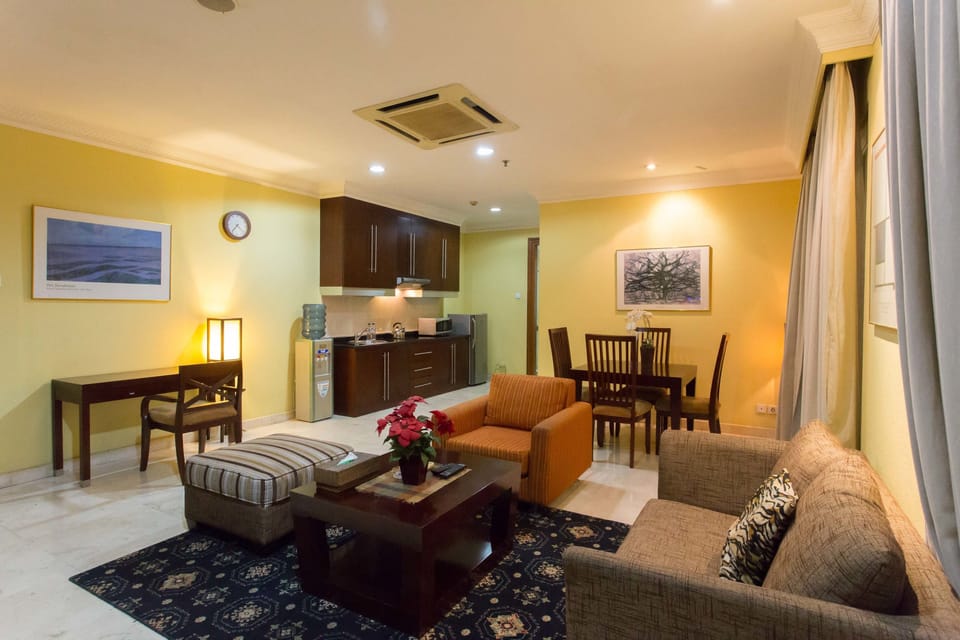 Suite, 2 Bedrooms | Living area | LCD TV