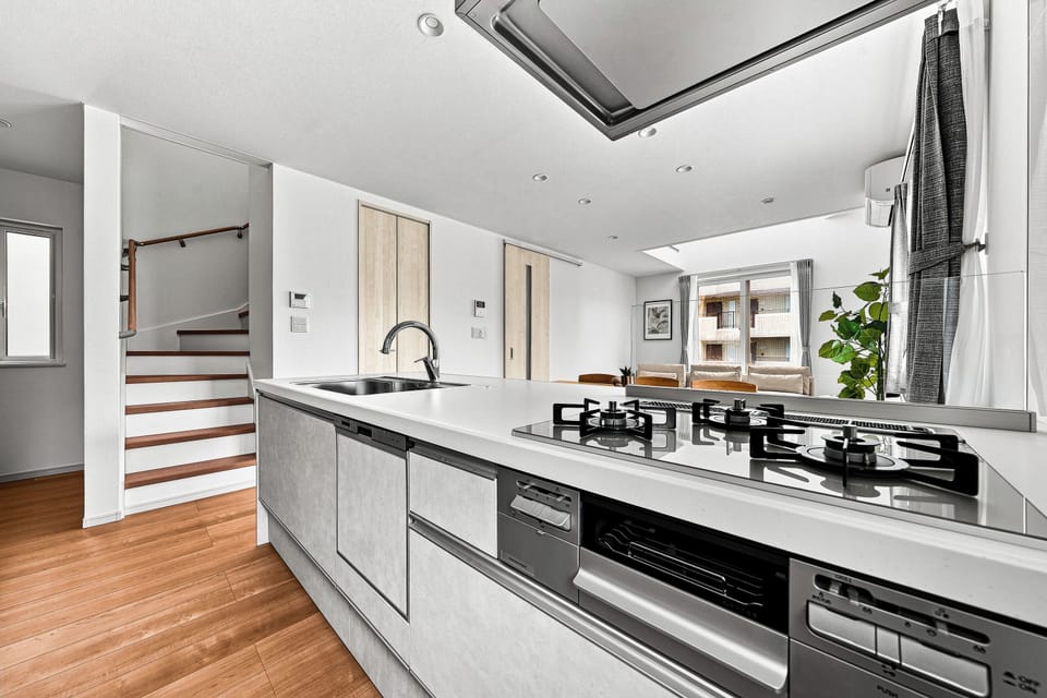 Apartment | Private kitchen | Fridge, microwave, stovetop, dishwasher
