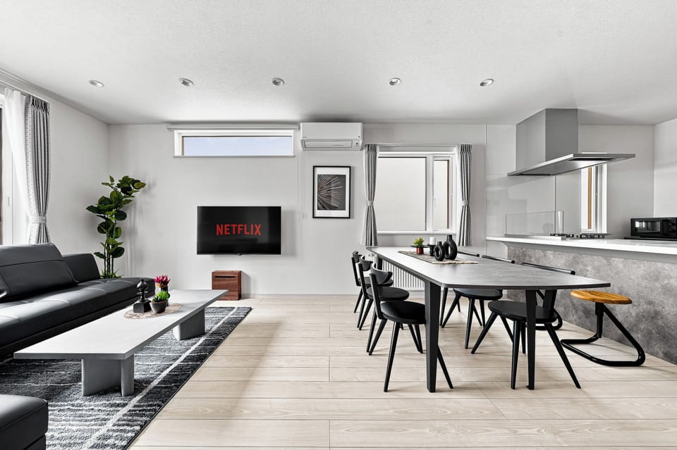 Apartment | Living area | 50-inch flat-screen TV with digital channels