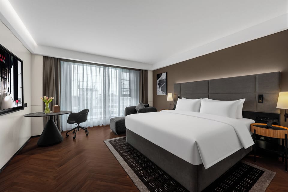 Standard Double Room, Courtyard View | Down comforters, minibar (free items), in-room safe, desk