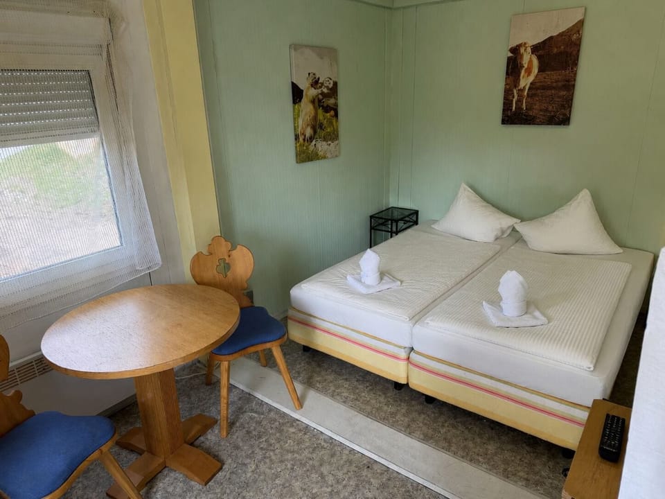 Desk, WiFi (free), bed sheets