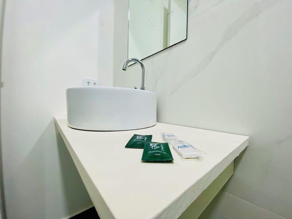 Basic Room, Air conditioning | Bathroom | Free toiletries, towels, soap, shampoo