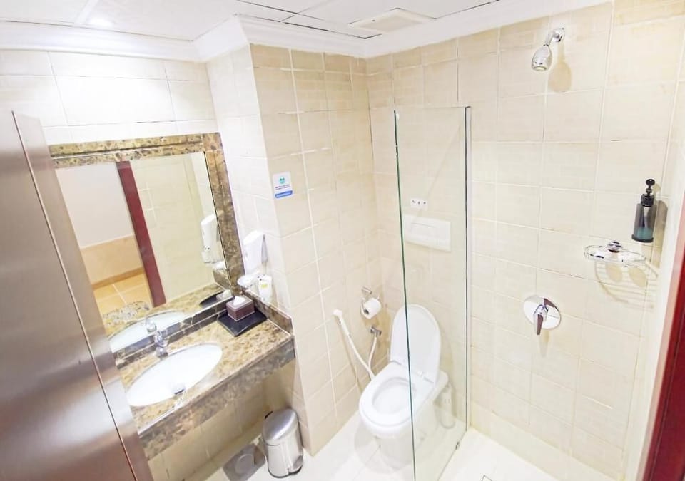 Quadruple Room | Bathroom | Shower, free toiletries, hair dryer, soap