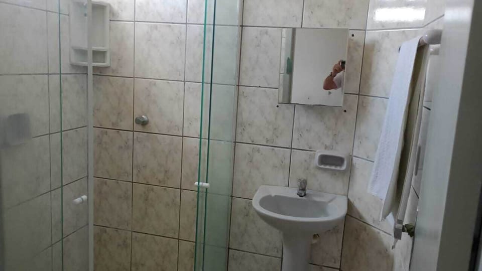 Shower, towels, soap, toilet paper