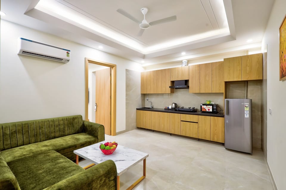 Studio Suite | Living area | 54-inch LED TV with digital channels, printers
