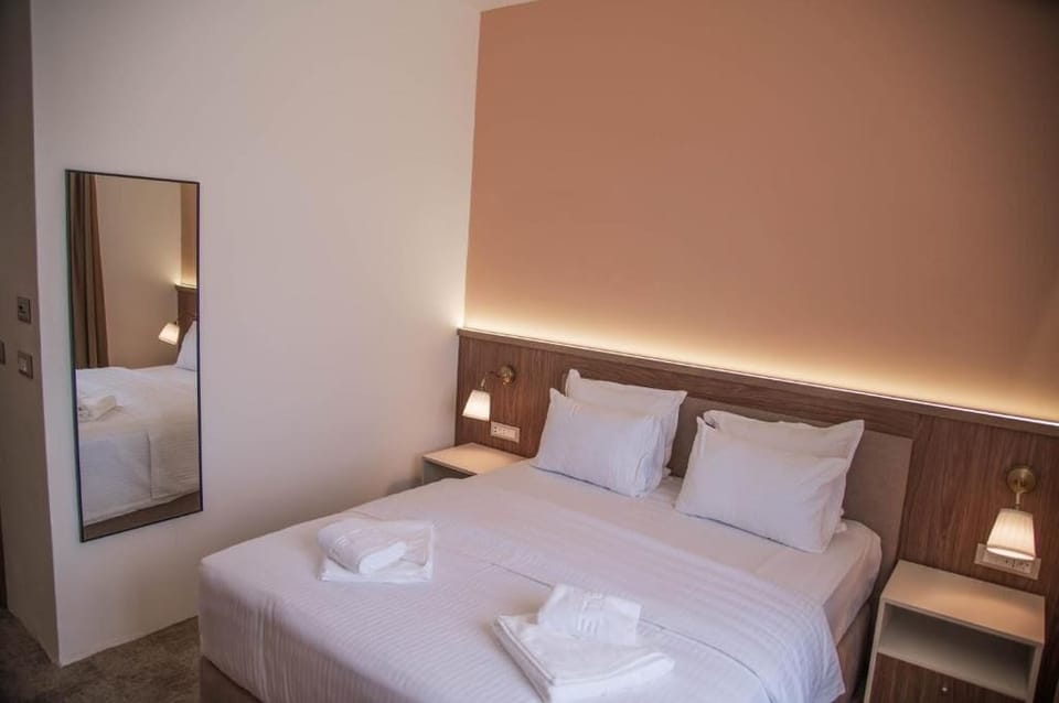 Standard Double Room, City View | In-room safe, desk, laptop workspace, soundproofing
