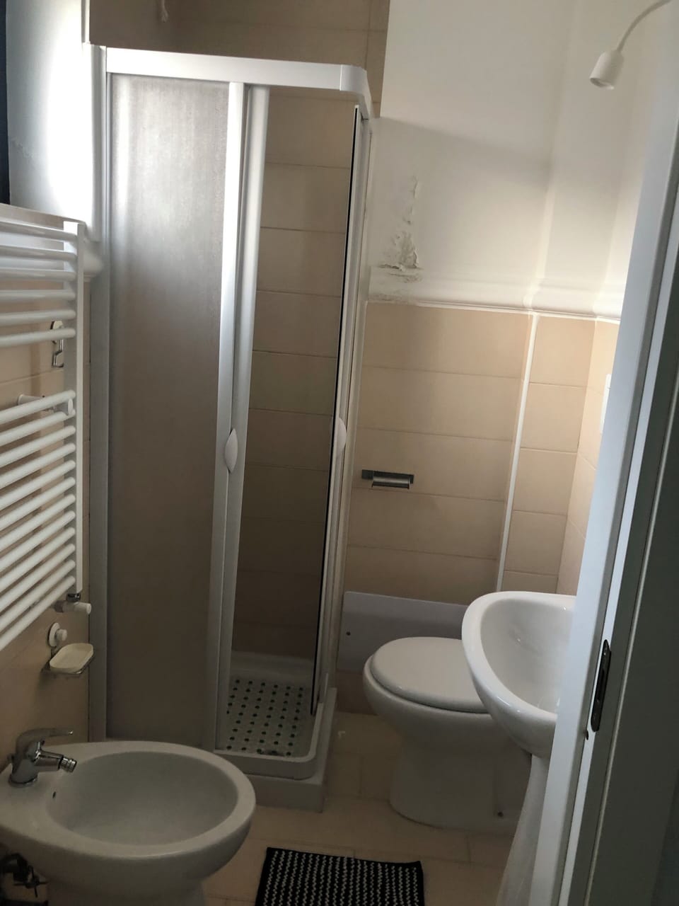 Combined shower/tub, hair dryer, towels, soap