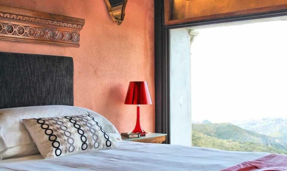 Luxury Suite, Partial Sea View | Desk, WiFi (free), bed sheets
