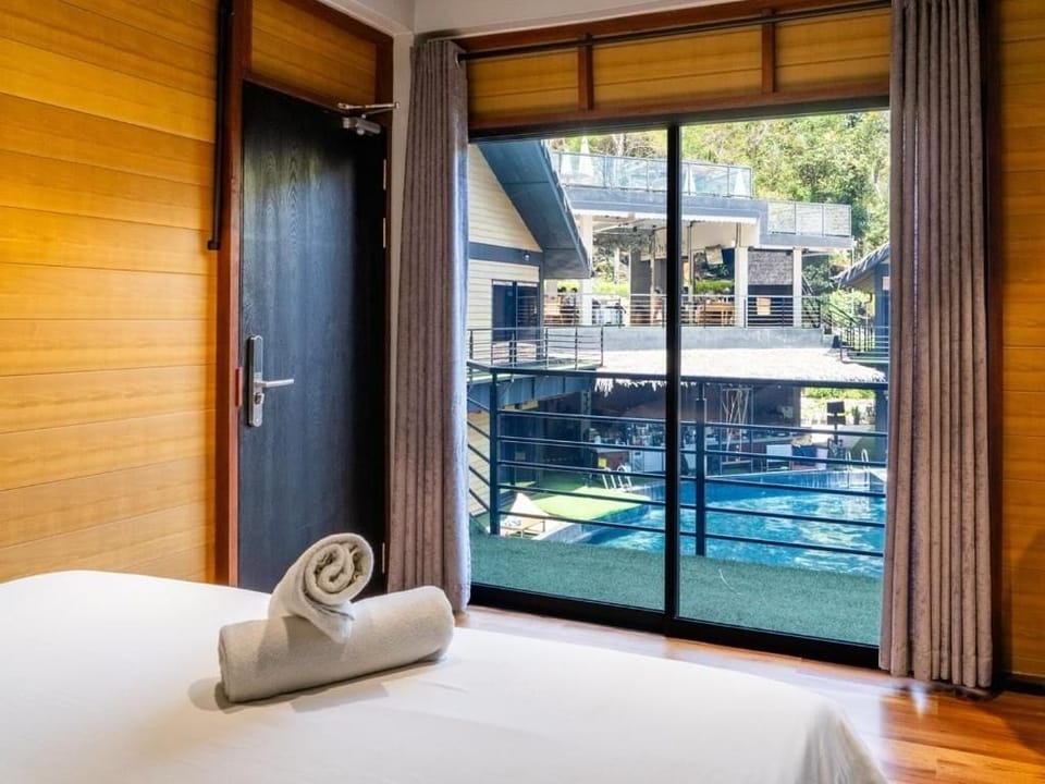 Deluxe Double Room, Pool View | In-room safe, desk