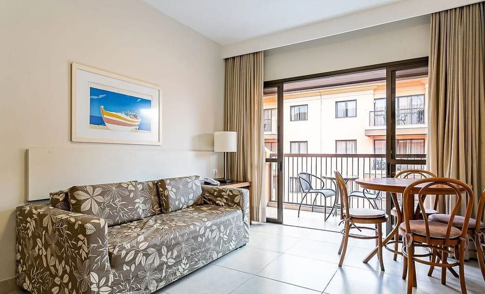 Basic Apartment | Living area | 40-inch TV with digital channels