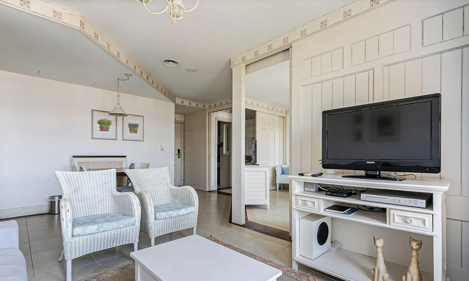 Basic Apartment | Living area | 40-inch TV with digital channels