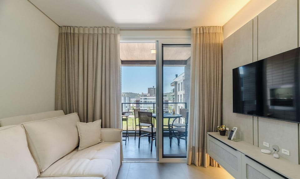 Basic Apartment | Living area | 40-inch TV with digital channels
