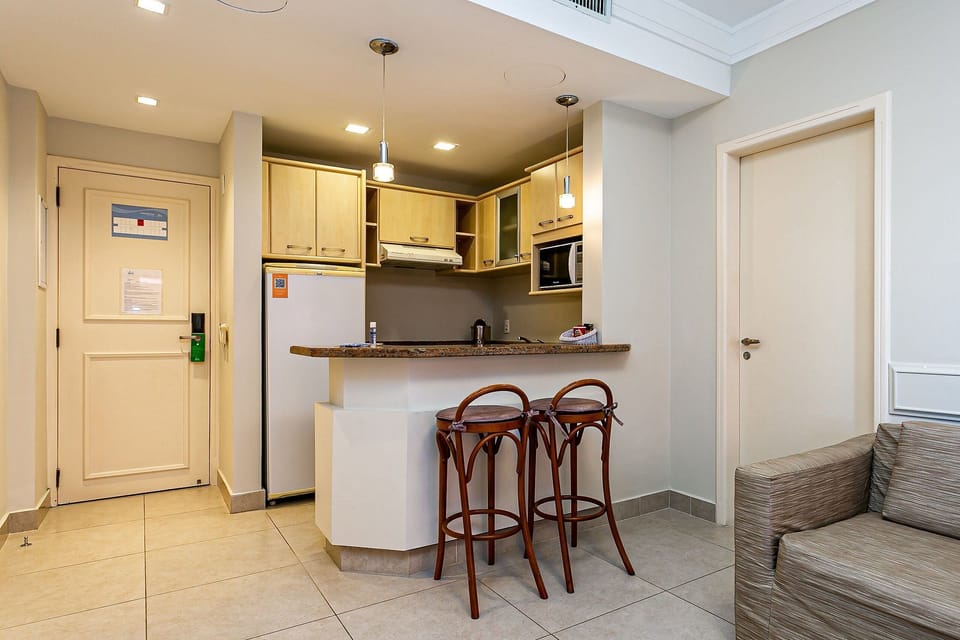 Basic Apartment | Living area | 40-inch TV with digital channels