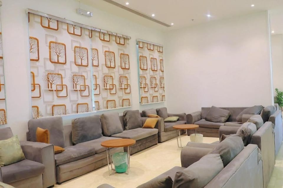 Basic Triple Room | Living area | 30-inch LED TV with cable channels