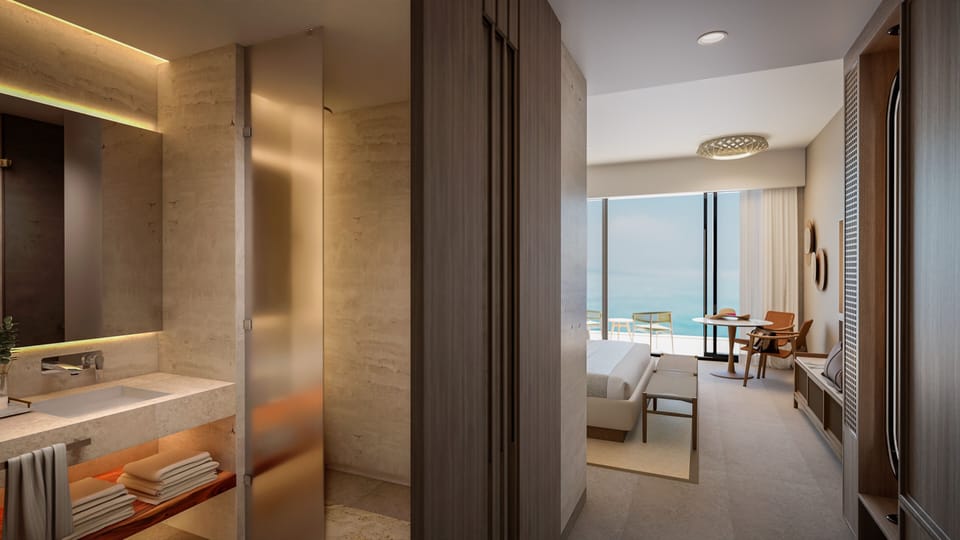 Deluxe Room, 1 King Bed, Ocean View | Bathroom | Separate tub and shower, free toiletries, hair dryer, slippers
