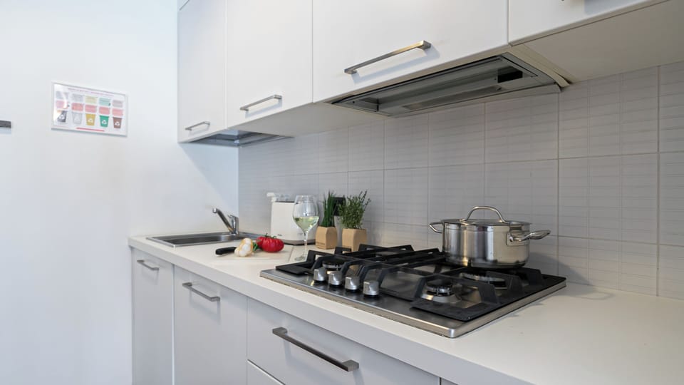 Apartment (1 Bedroom) | Private kitchen | Espresso maker, oven, stovetop, dishwasher