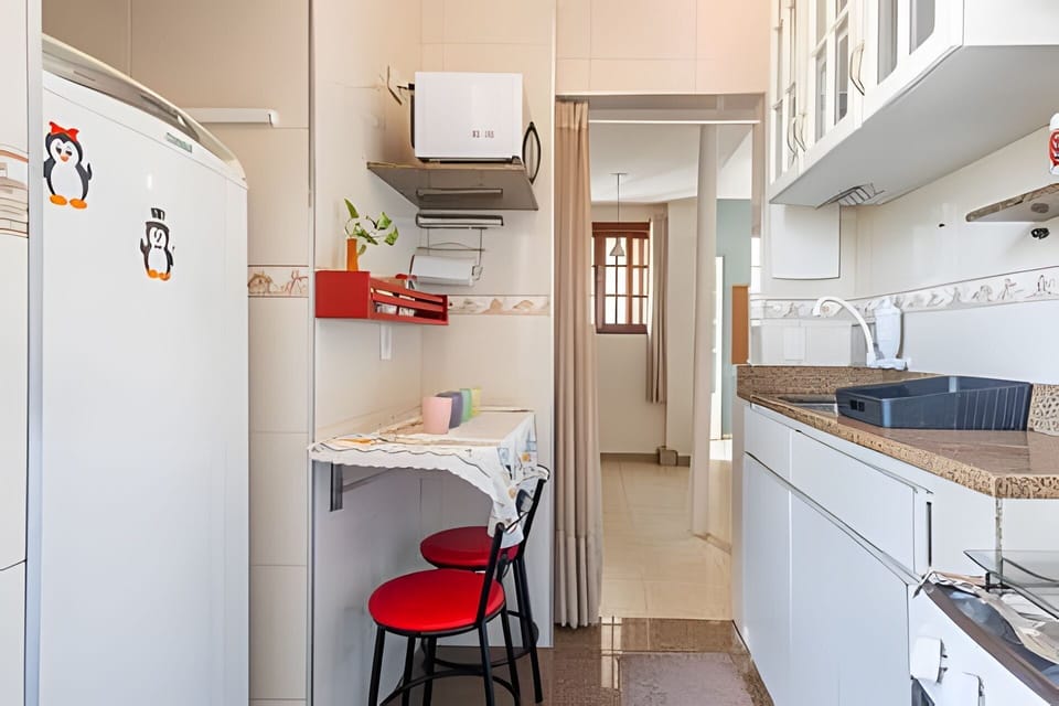Comfort Apartment | Private kitchen | Full-size fridge, microwave, oven, stovetop