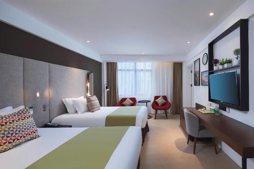 Standard Double Room, City View | Blackout drapes, soundproofing, WiFi (free), bed sheets