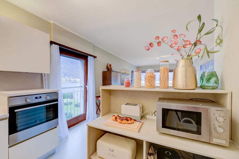 Family Apartment, 2 Bedrooms, Microwave, Lakeside (Emotion Lake Lugano with direct lake) | Private kitchen | Coffee/tea maker, electric kettle