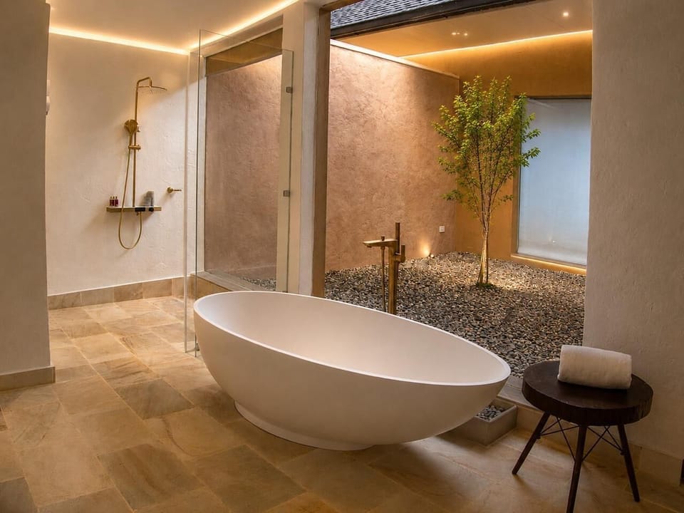 Separate tub and shower, slippers, towels, soap
