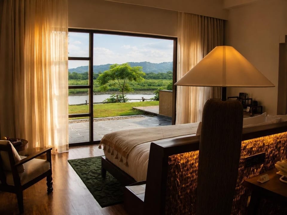 Luxury Double Room, Patio, River View | Desk, laptop workspace, iron/ironing board, WiFi (free)
