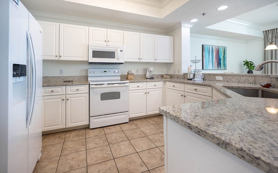 Condo, 2 Bedrooms | Private kitchen | Coffee/tea maker, fridge, oven