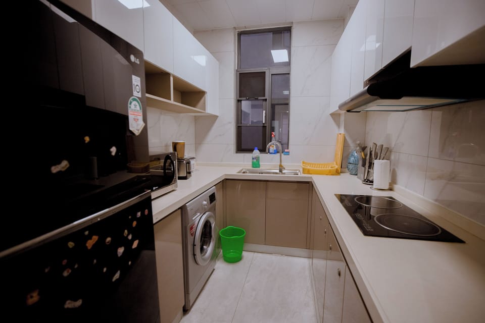 Executive Apartment, Balcony, Pool View | Private kitchen | Espresso maker, coffee/tea maker, full-size fridge, oven