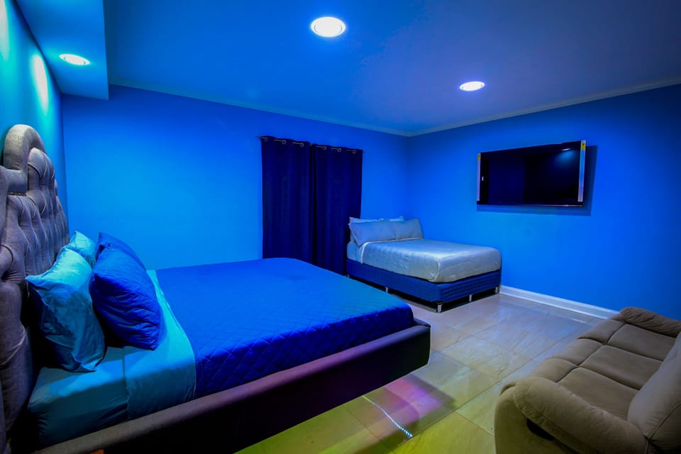 Pillowtop beds, blackout drapes, iron/ironing board, WiFi (free)