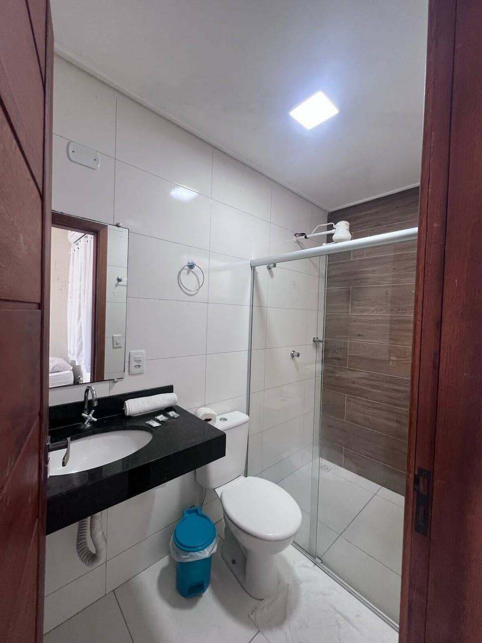 Quadruple Room | Bathroom | Shower, towels, toilet paper