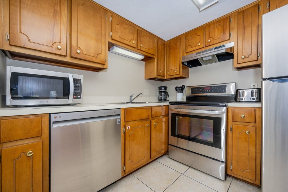 Condo, 2 Bedrooms | Private kitchen | Coffee/tea maker, fridge, oven