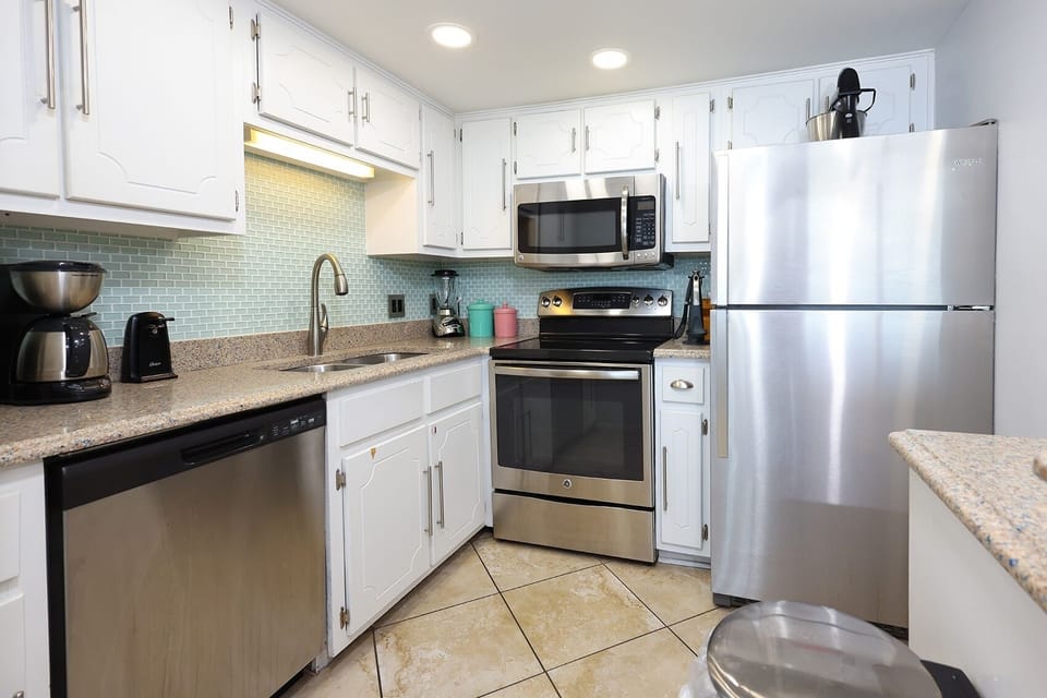 Condo, 2 Bedrooms | Private kitchen | Coffee/tea maker, fridge, oven
