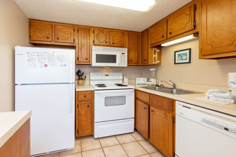 Condo, 2 Bedrooms | Private kitchen | Coffee/tea maker, fridge, oven