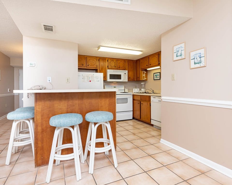 Condo, 2 Bedrooms | Private kitchen | Coffee/tea maker, fridge, oven
