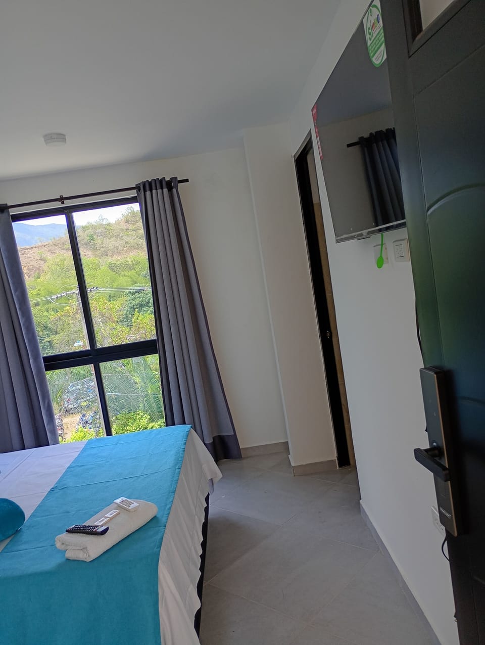 Comfort Room, Air conditioning, Garden View | WiFi (free), bed sheets