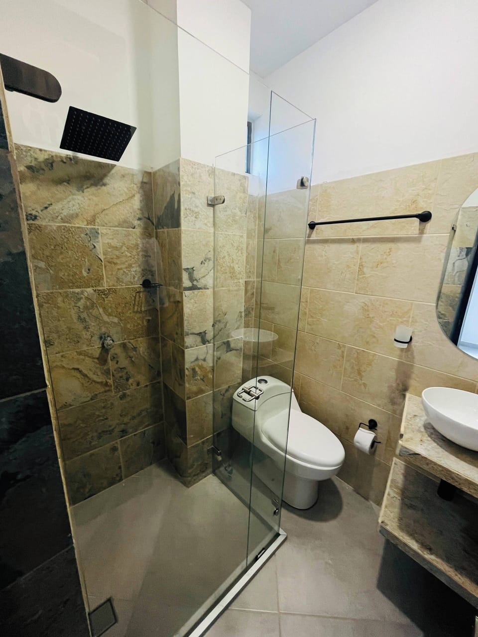Shower, towels, soap, toilet paper