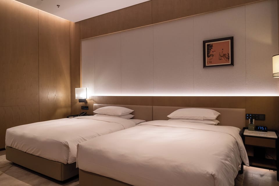 Deluxe Family Twin Suite | In-room safe, blackout drapes, iron/ironing board (on request)
