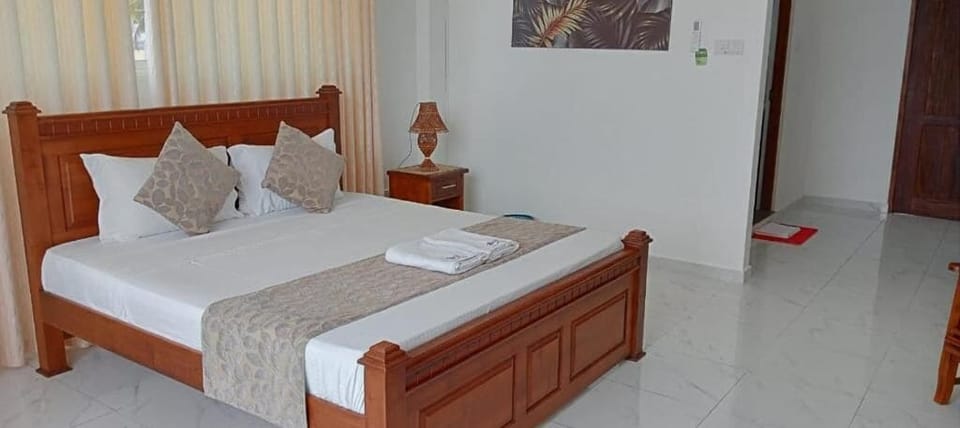 Deluxe Double Room, Balcony, Beach View | Iron/ironing board, WiFi (free)